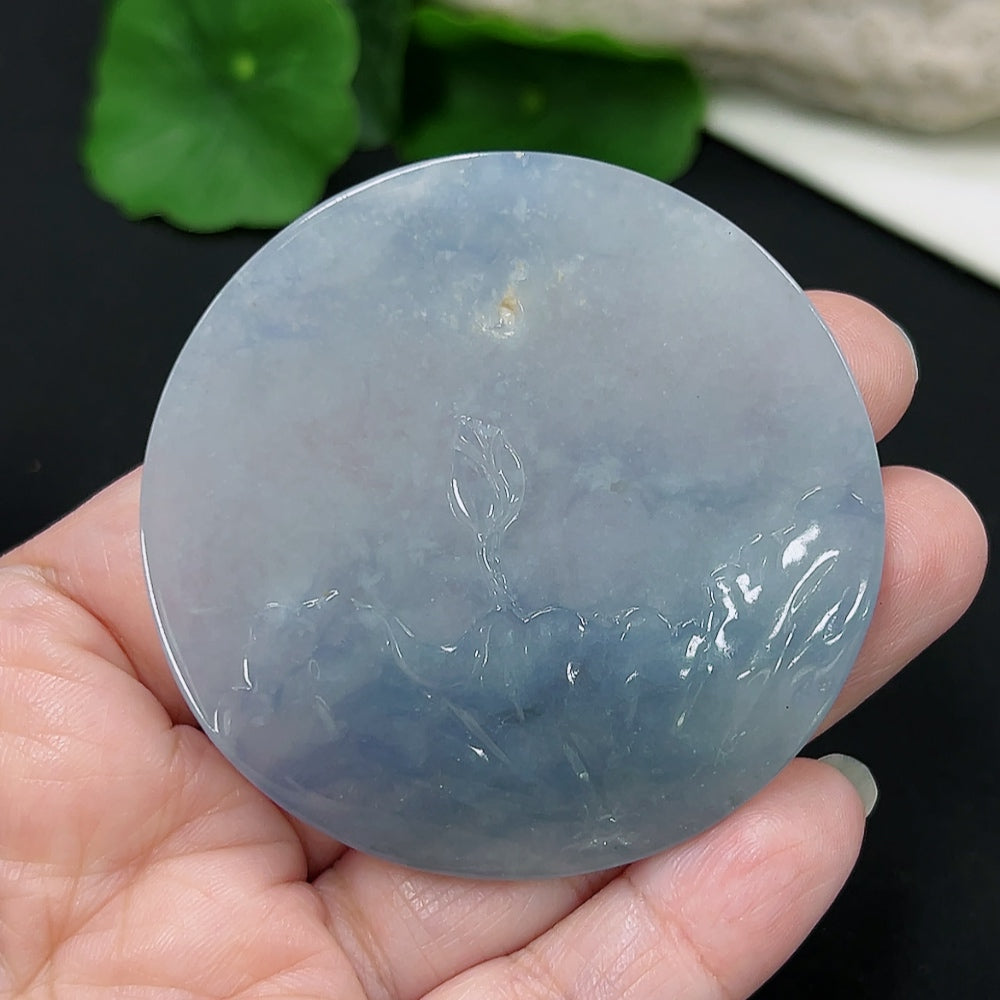 Jadeite lotus pendant from HKHQ, crafted from green jade with intricate lotus petal design, weighs approximately 39.4 grams.