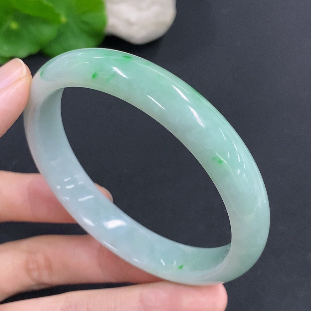 HKHQ jadeite round bangle with a smooth surface, 59.5mm size and approximately 46.8g weight, showcasing rich green jade color.
