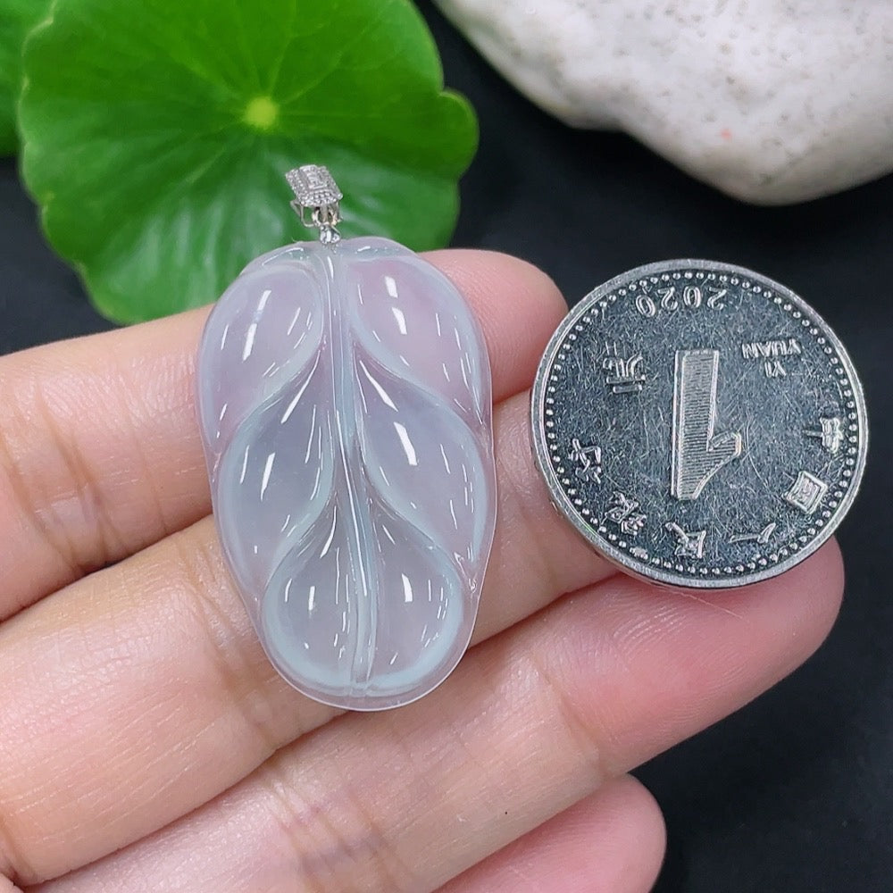 Jadeite leaf pendant with 18k gold setting, handcrafted by HKHQ, weighing approximately 4g, showcasing intricate jade craftsmanship.