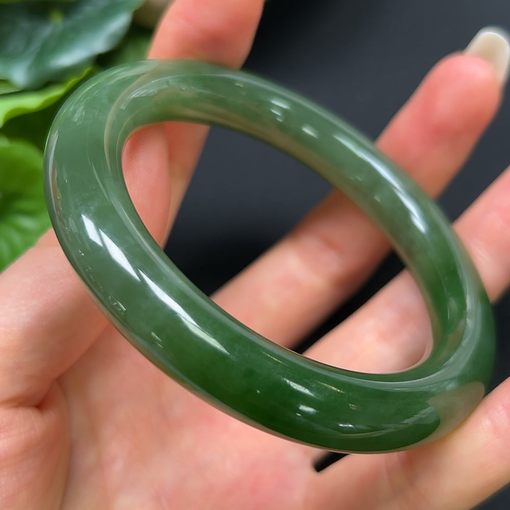 Hetian Jade round bangle bracelet by HKHQ, size 55.4, weighing 56.99g, smooth polished surface, elegant jewelry accessory.