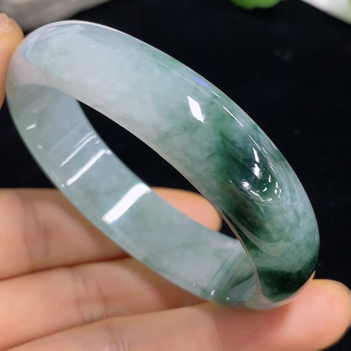 HKHQ Jadeite Concubine Bracelet with 37.7g weight, size 53.8/45.6, featuring smooth jadeite beads and intricate craftsmanship.