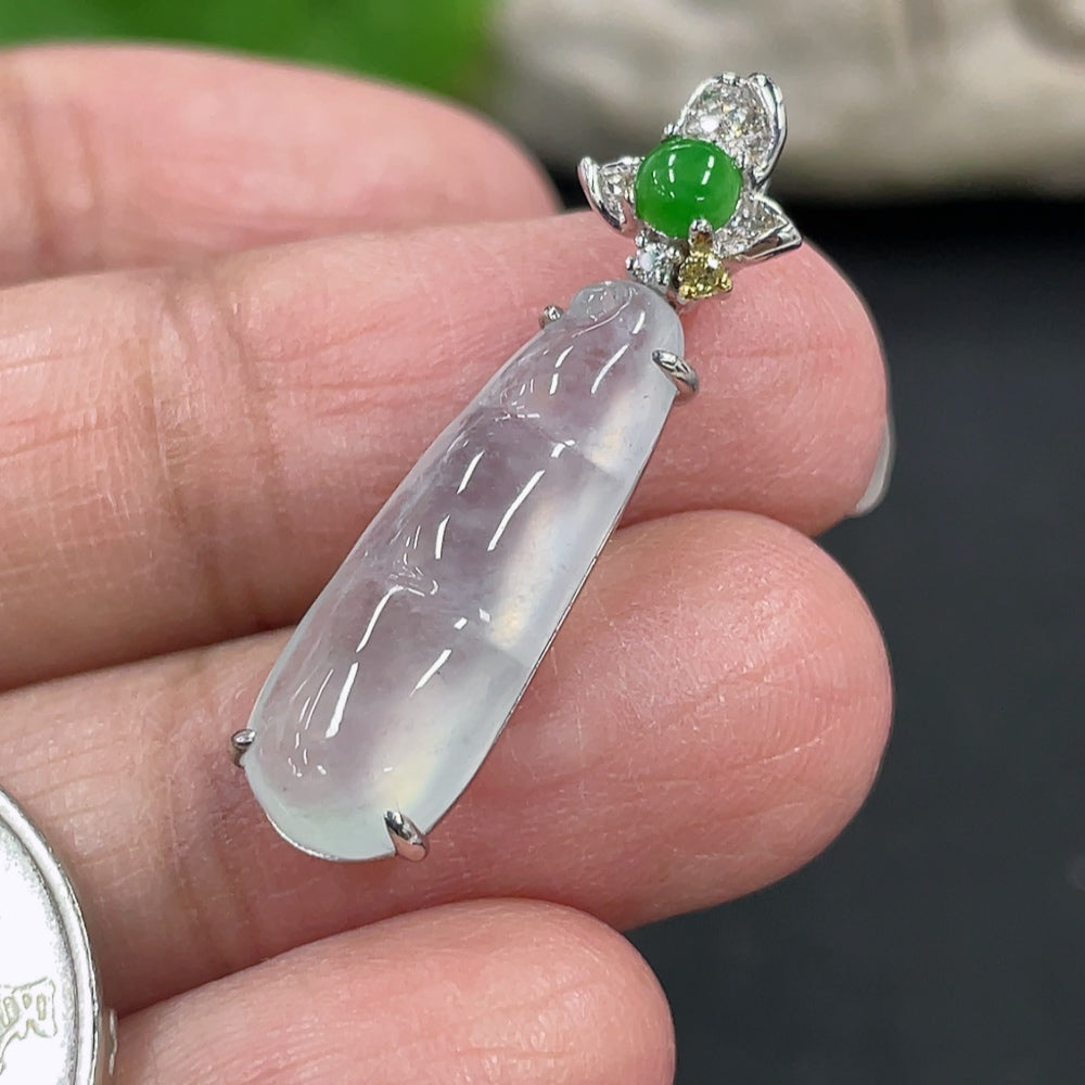Jadeite Blessed Bean Pendant in 18K gold setting with diamond accents, featuring a carved jade bean and delicate jewelry design.