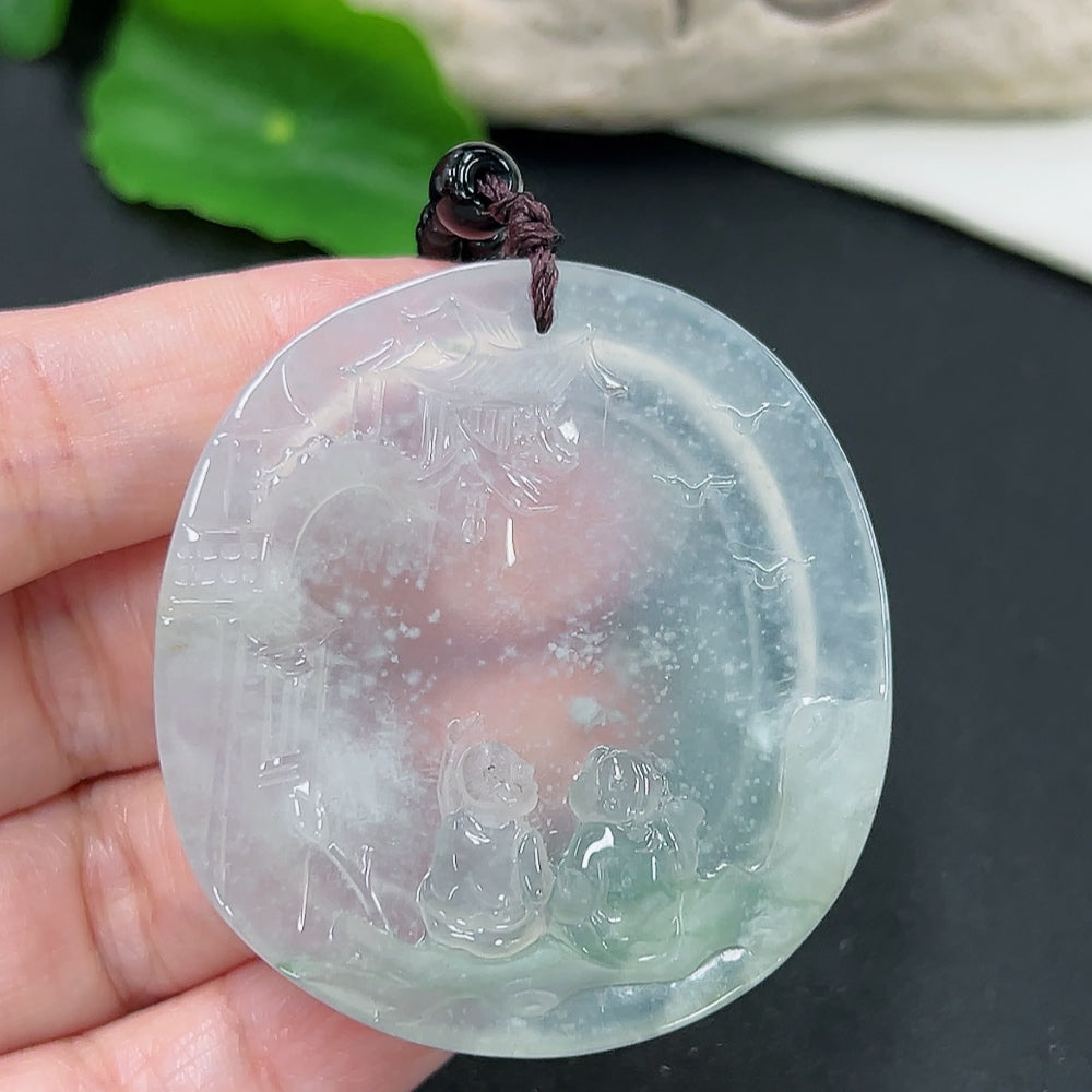 Jadeite pendant from HKHQ featuring a polished jade jadeite stone with rope and accessory beads, weighing approximately 31.5g.