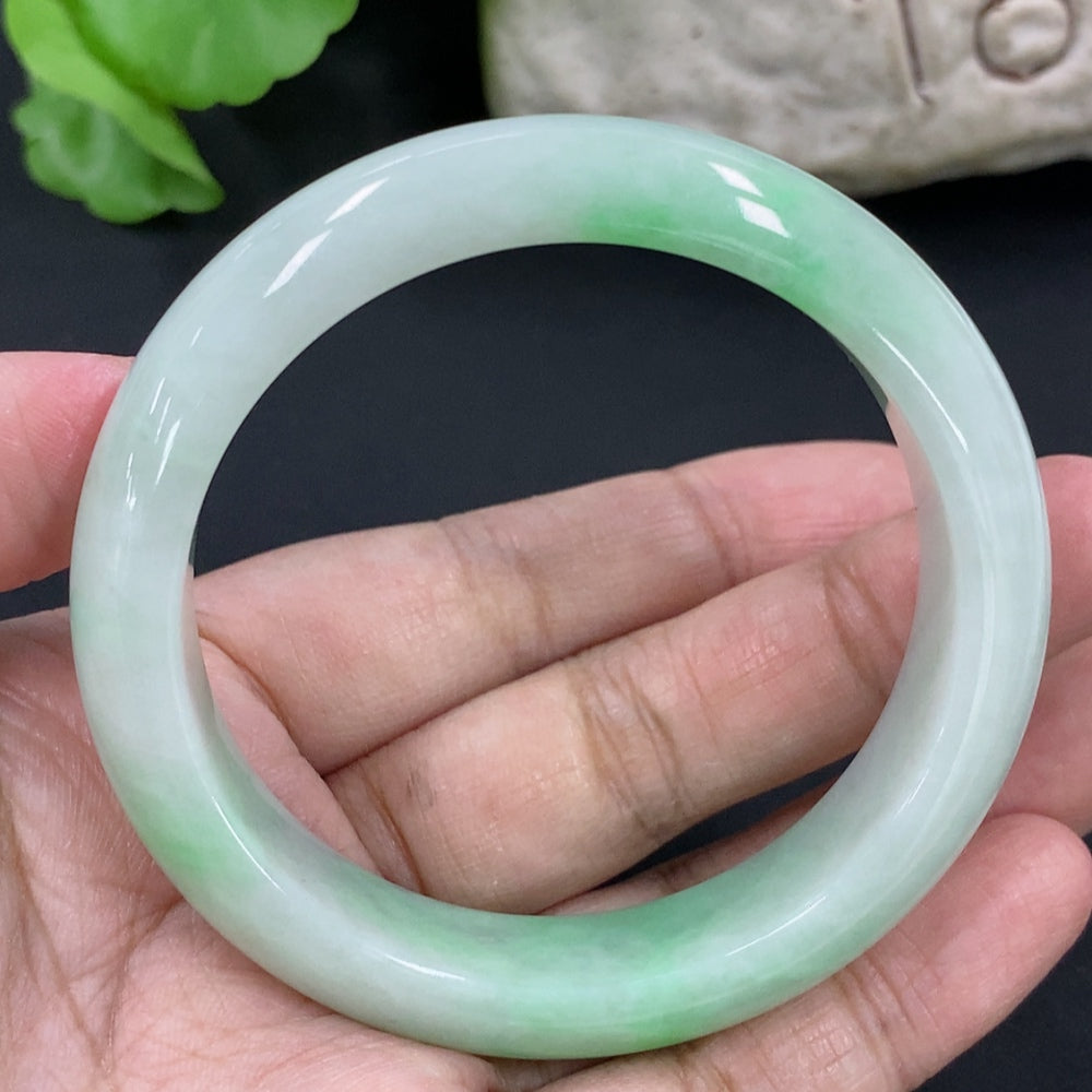 HKHQ jadeite round bangle in size 53.8 with a weight of 56.6g, showcasing smooth, polished jadeite bracelet design.