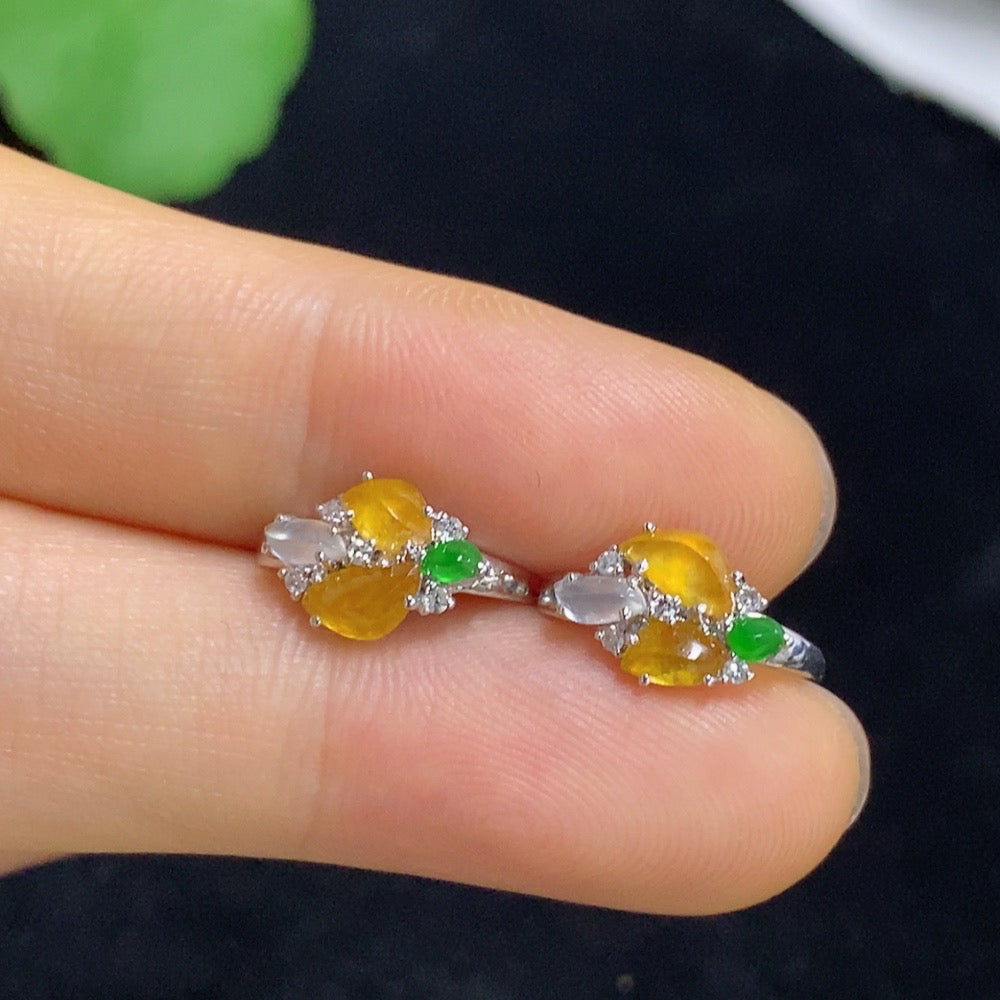 Jadeite ear clips with 18k gold and diamond accents, total weight approximately 2.18 grams
