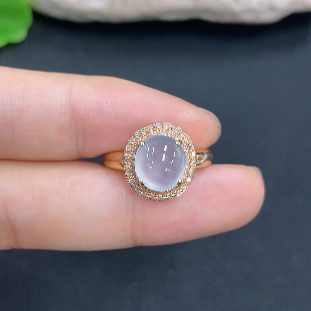 HKHQ jadeite ring with 18k gold and diamond side stones, size 14, featuring a polished jade gemstone and intricate design.