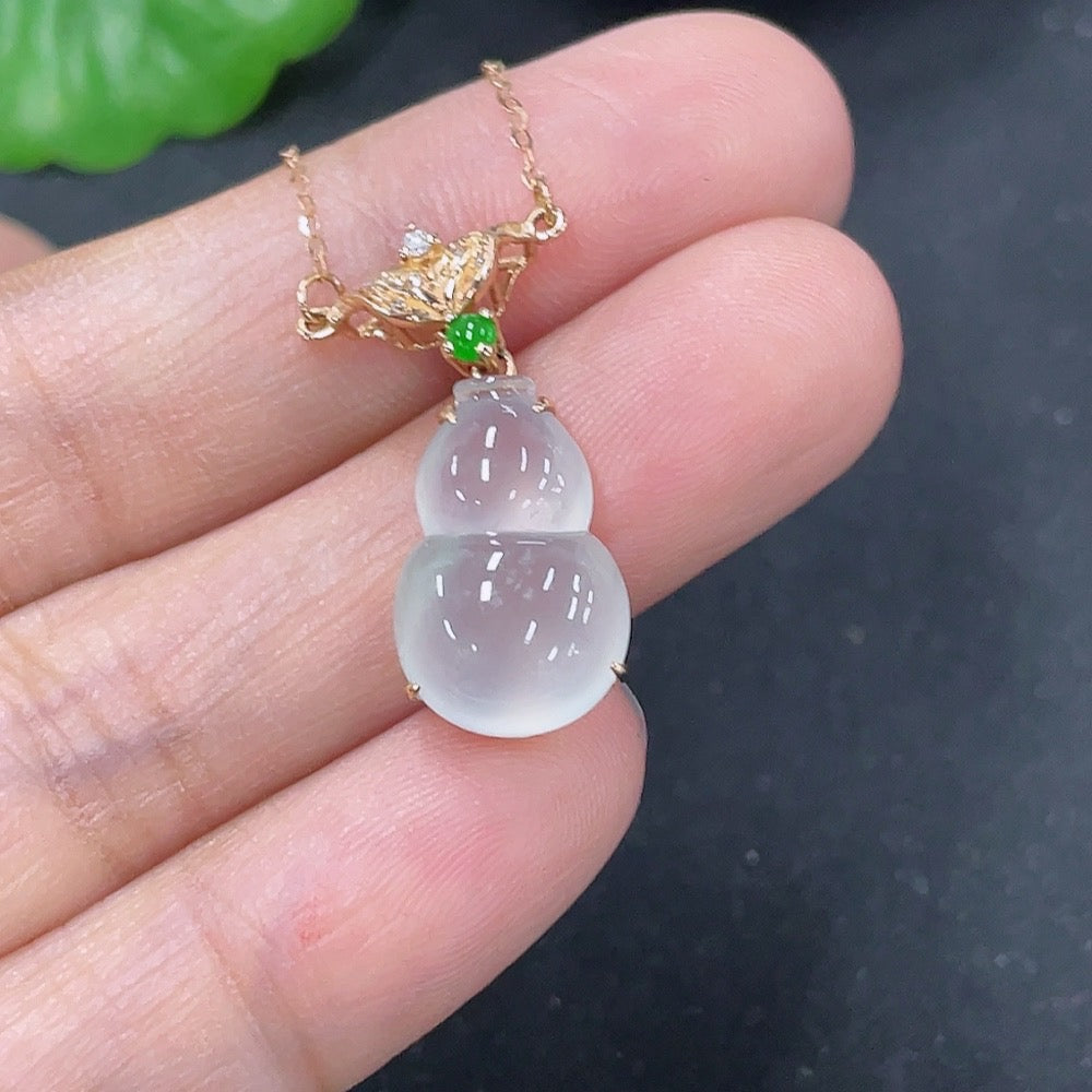 Jadeite inlaid gourd pendant with 18K gold and diamond accents, elegant necklace by HKHQ featuring detailed craftsmanship.