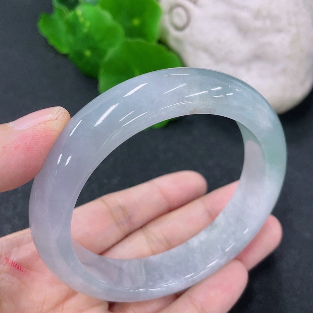 Jadeite round bracelet with 54mm diameter, crafted by HKHQ, showing smooth jade stones and polished finish.