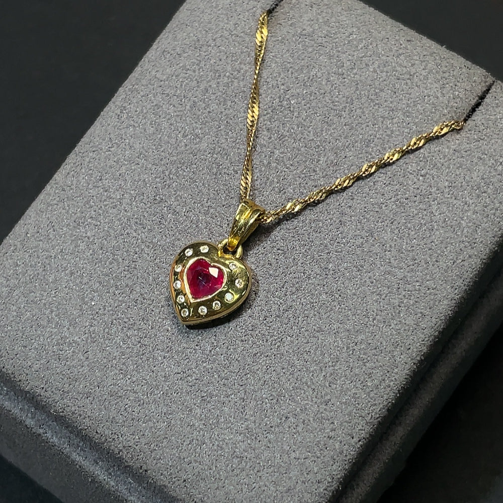 18K gold ruby pendant with diamond accents, total weight including chain approximately 4.14g