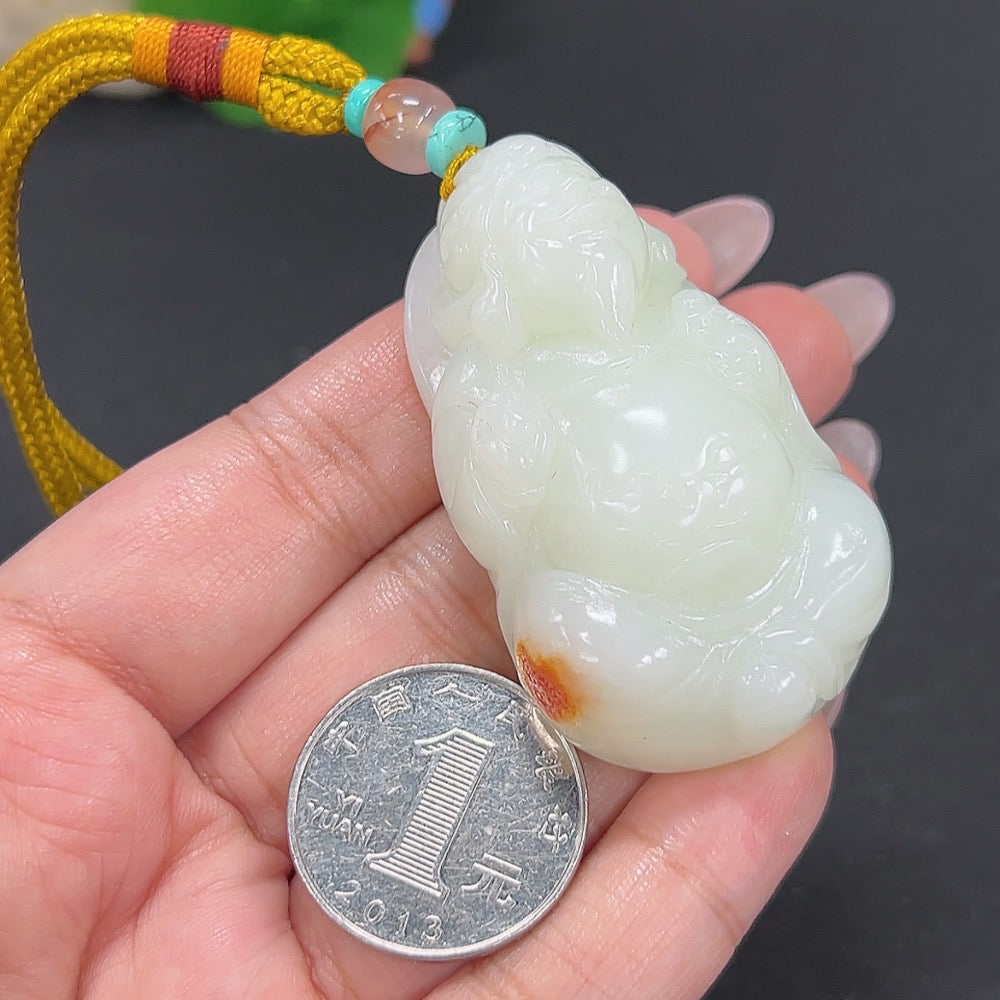Deer-shaped Hetian jade pendant featuring the God of Wealth, weighing approximately 64.7g, with a natural jade color and rope.