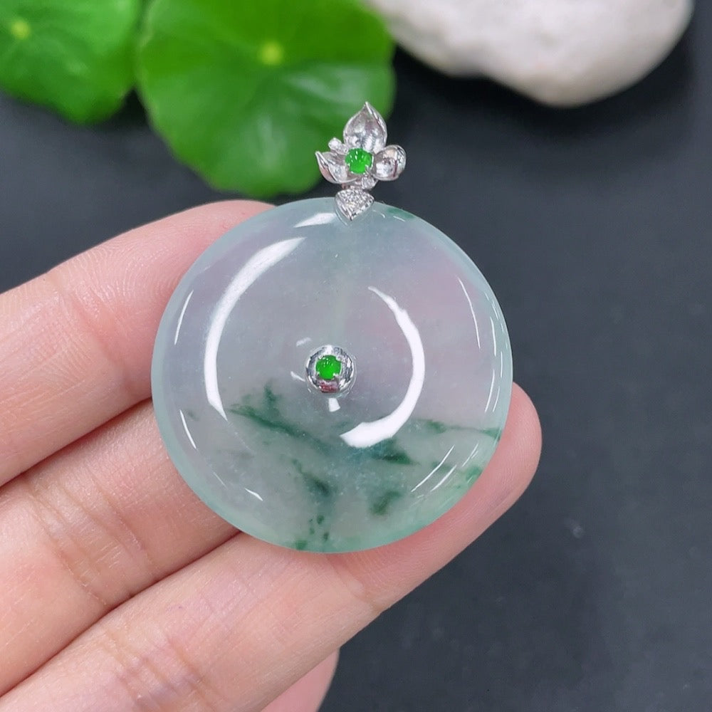 Jadeite pendant with peace buckle design from HKHQ, featuring a polished jade stone and 18k gold accents, weighing approximately 9.25g.