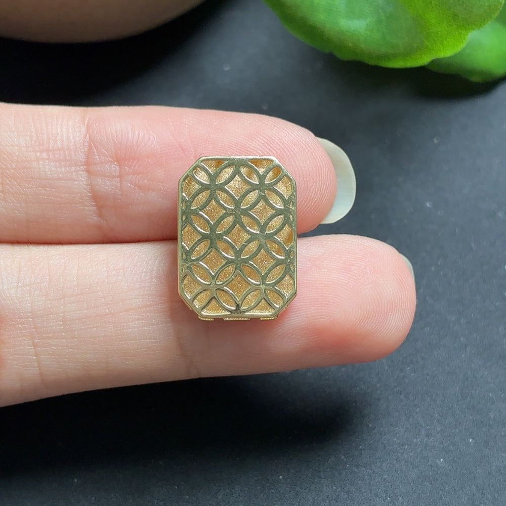 Jadeite inlaid pendant with diamond accents on an 18k necklace, showcasing intricate craftsmanship and elegant design.