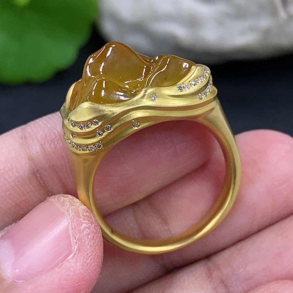 Jadeite inlaid ring with 18k gold and diamond accents, size 16, featuring a polished jade stone in a detailed gold setting.