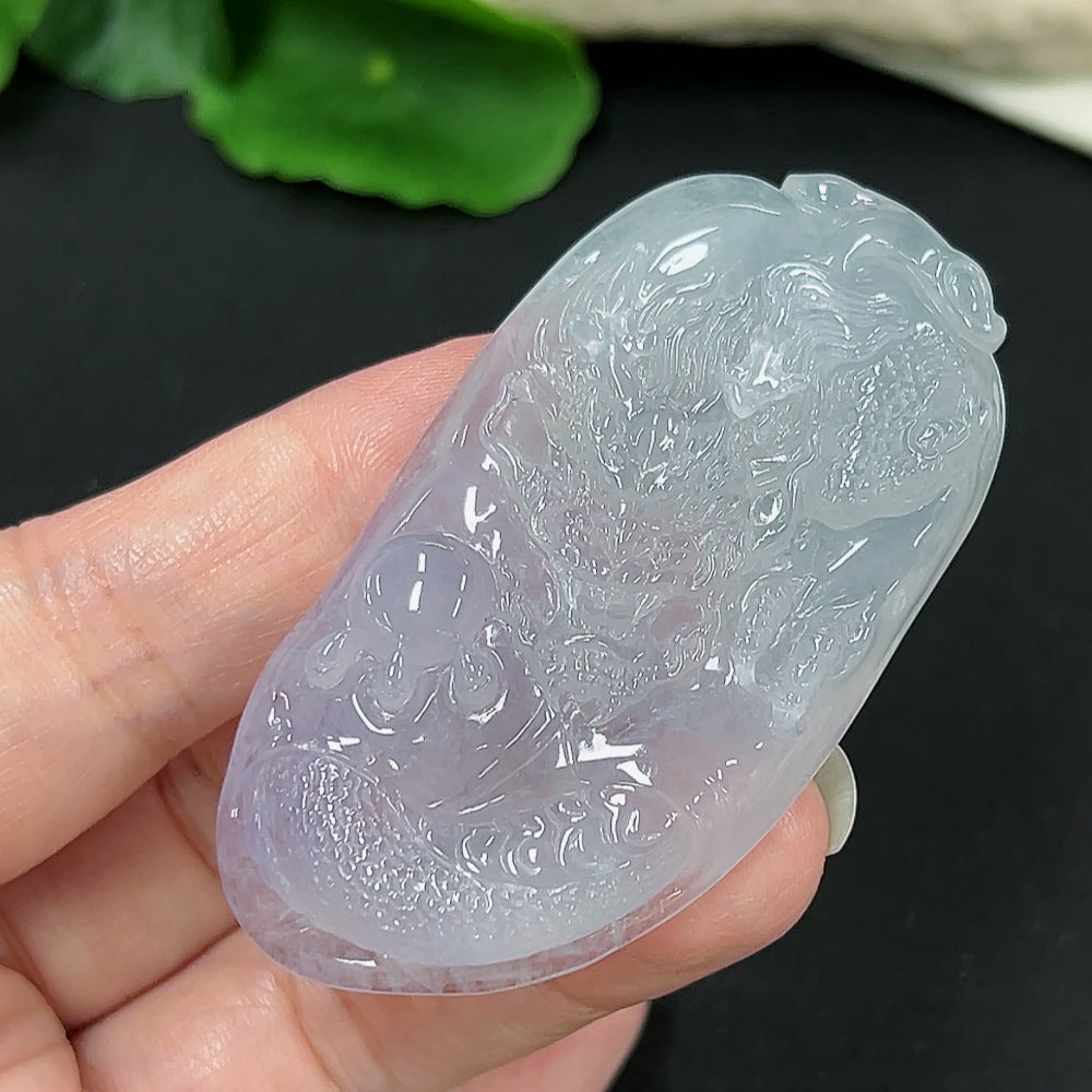 Jadeite dragon pendant from HKHQ, detailed green jade carving with intricate dragon design, weighs approximately 34 grams.
