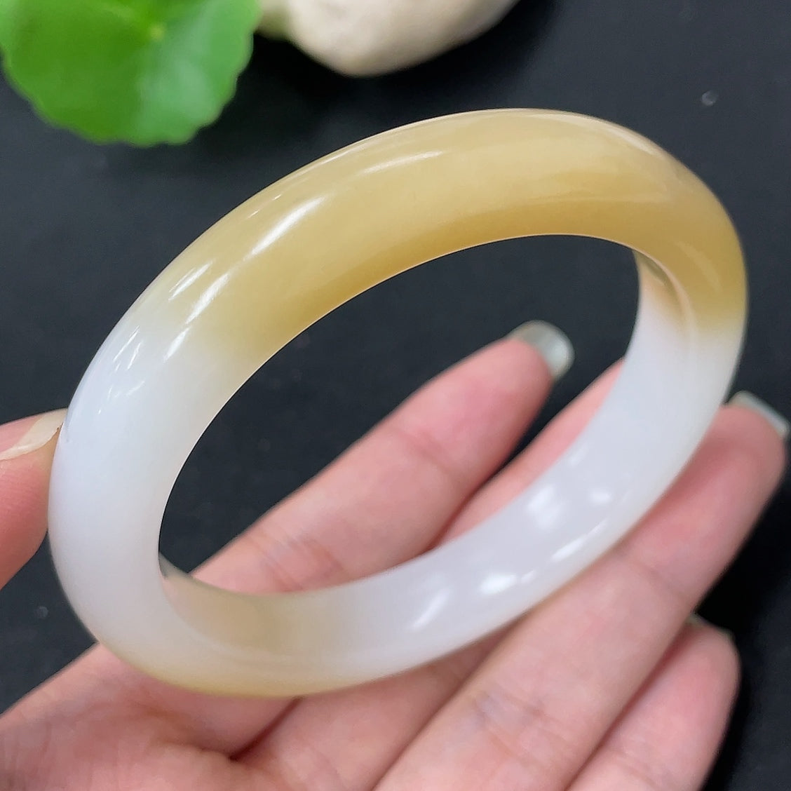 HKHQ Hetian Jade round bracelet, size 57.3, approx. 52.5g, featuring smooth, polished jade beads on a delicate string.