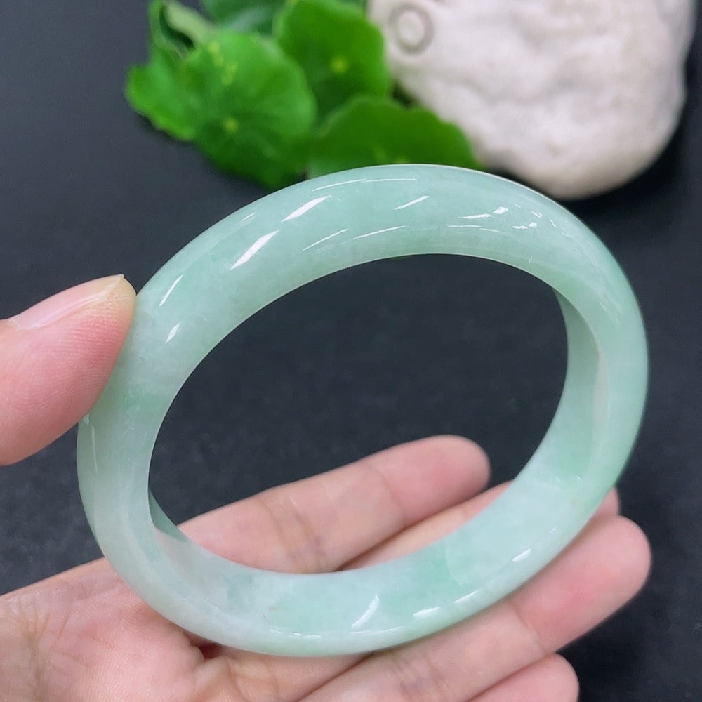 Jadeite round bracelet with 58mm diameter and 54.45g weight, featuring smooth green jade beads, by HKHQ.