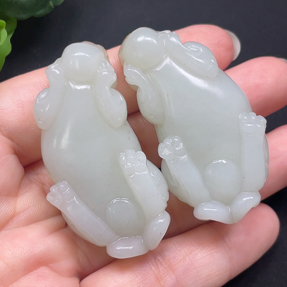 Hetian jade Pixiu pendant from HKHQ, crafted in green jade with detailed carving, weighing approximately 73.49g.