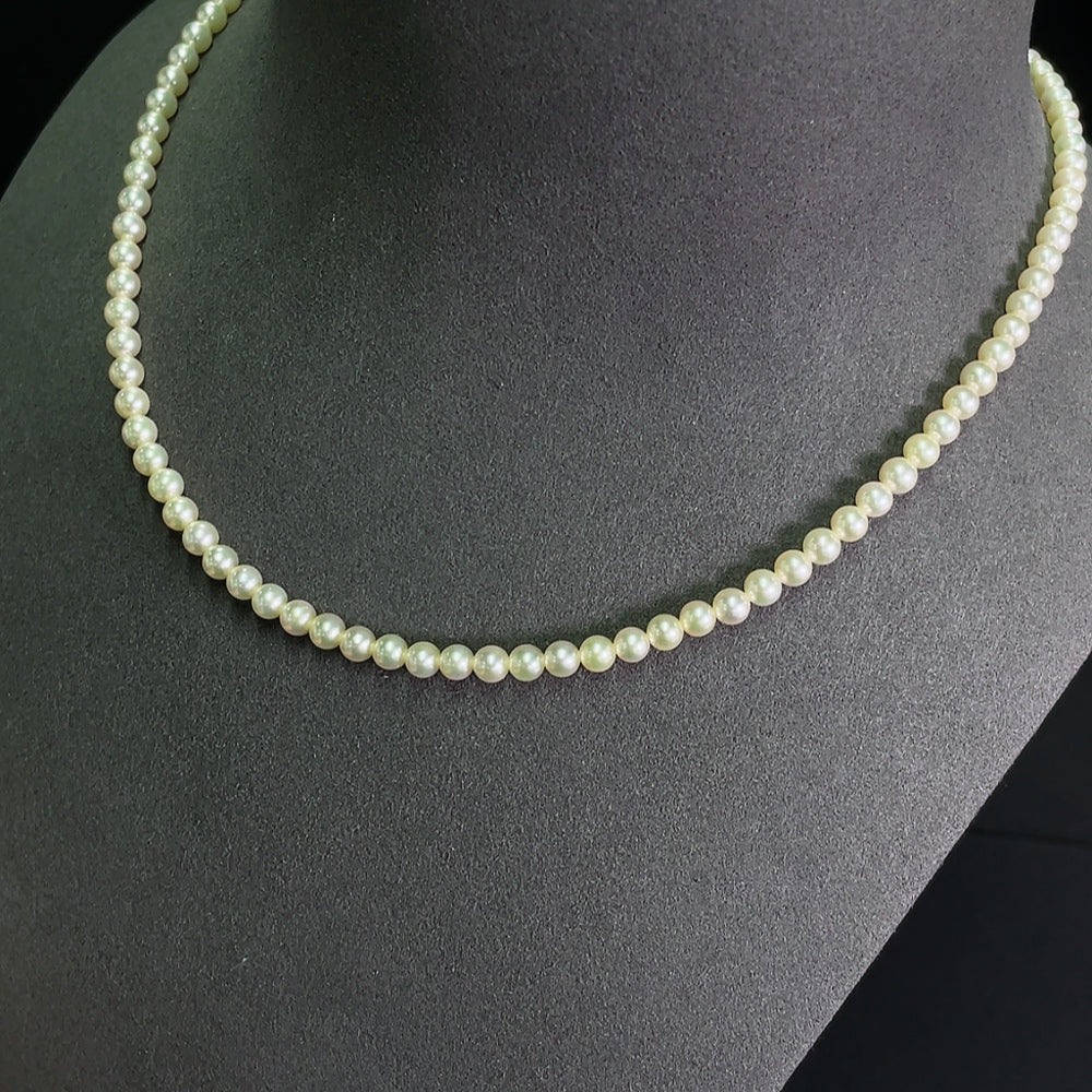 HKHQ seawater pearl strand with non-gold 4-4.4mm pearls, total weight approx. 12.04g, featuring smooth, lustrous pearls.