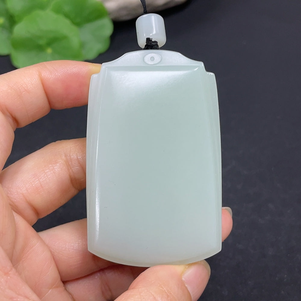 Hetian Jade plain pendant necklace from HKHQ, showcasing a smooth, polished jade pendant weighing 60.5g against a neutral background.