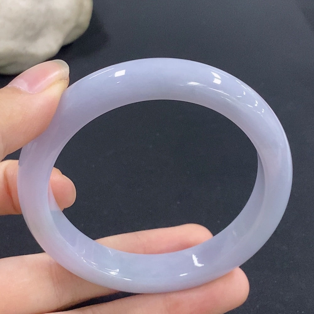 HKHQ jadeite round bangle size 56.1 with a total weight of 53.9g, showcasing smooth, polished green jade jewelry.