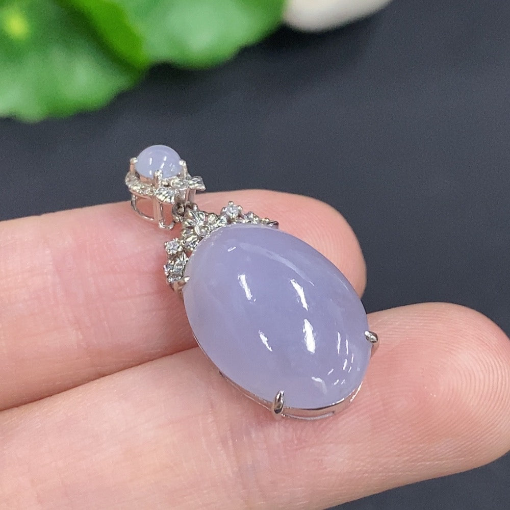 Jadeite cabochon pendant with 18K gold, non-diamond (too small to determine natural origin)