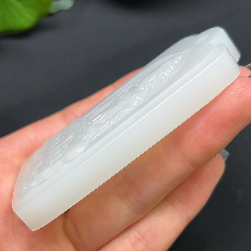 HKHQ Hetian Jade Guanyin pendant necklace with detailed carved figure, weighs approximately 94.14 grams, featuring traditional craftsmanship.