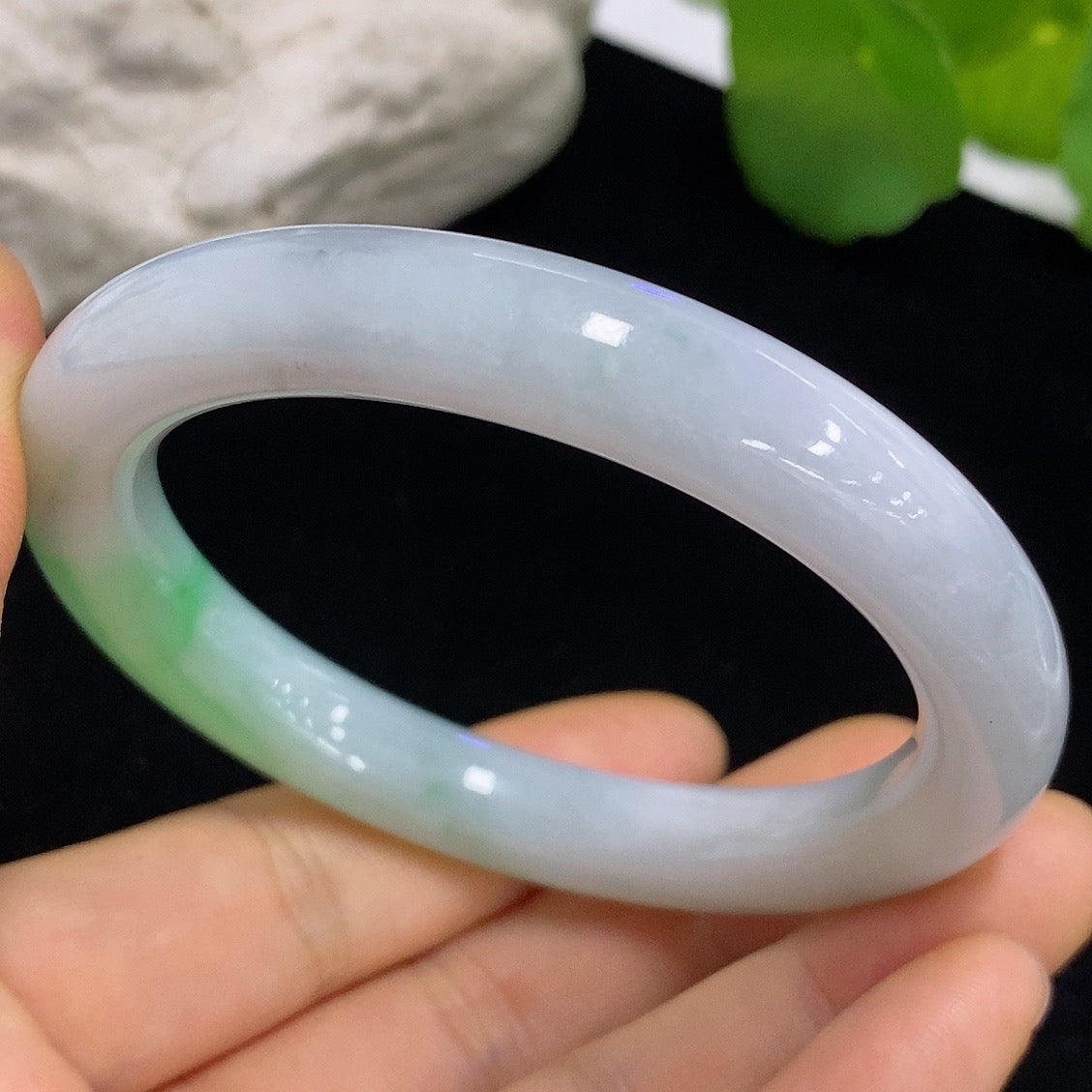 HKHQ jadeite round bangle, size 55, weighing 51.42g, showcasing smooth, polished jadeite bracelet on a neutral background.