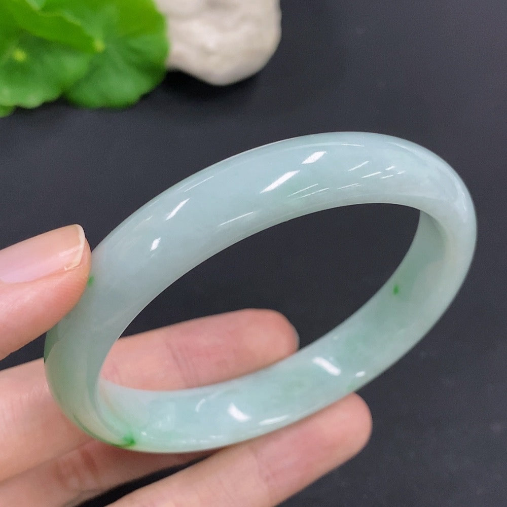 HKHQ jadeite round bangle with a 59.5mm size and approximately 46.8g weight, showcasing smooth, polished green jade jewelry.