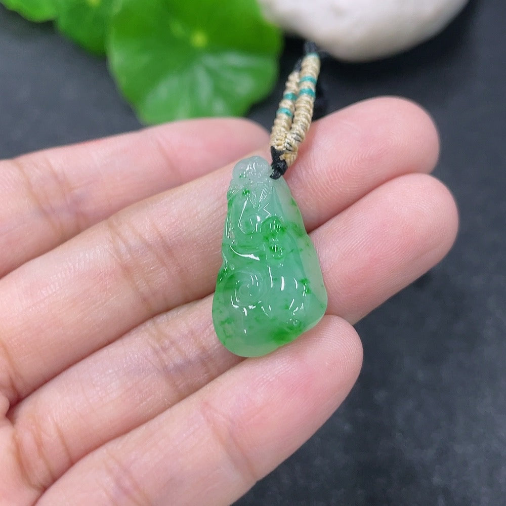 Jadeite pendant with Ruyi design, weighing approximately 4.45g, featuring a jade pendant on a rope from HKHQ.