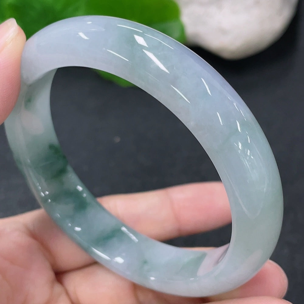 Jadeite round bangle with a 54.7mm diameter, 52.26g weight, crafted by HKHQ, featuring smooth, polished jade surface.