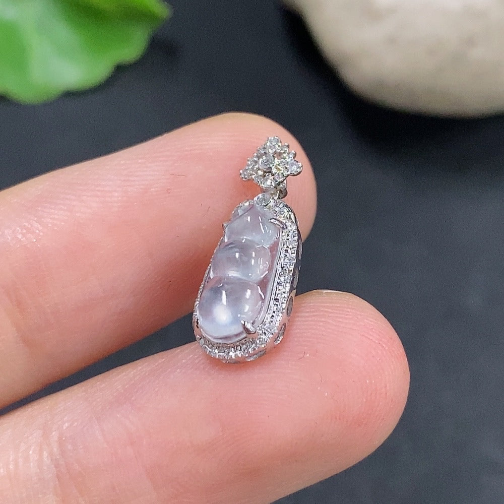 Jadeite auspicious bean pendant set in 18K gold with diamond accents, featuring a delicate jade jade pendant and matching jewelry.