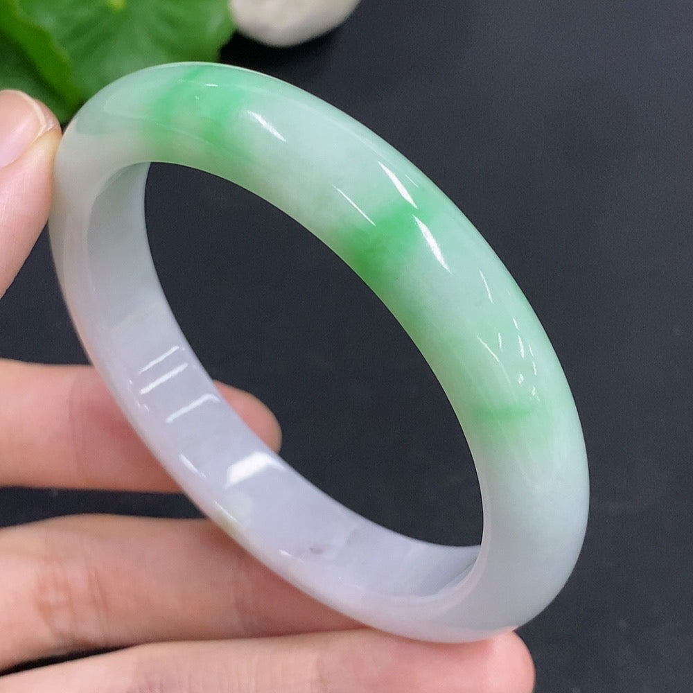 Jadeite round bracelet with minerals, weighing approx. 44g, size 55, crafted by HKHQ, featuring smooth jadeite beads with mineral inclusions.