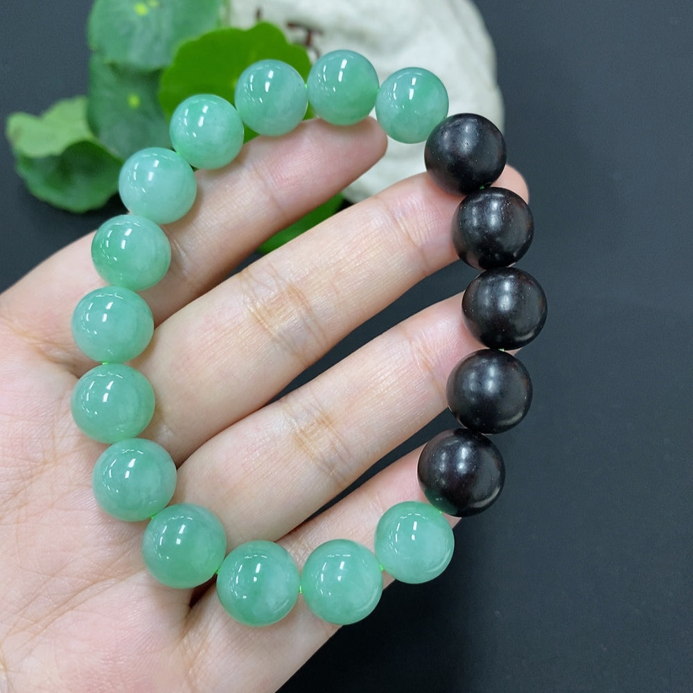Jadeite bead necklace with 11.2mm jade beads, weighing approximately 39.3g, featuring polished green jade stones from HKHQ.