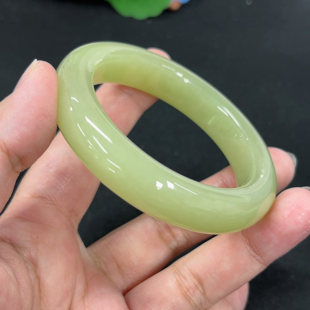 HKHQ Hetian Jade round bracelet, size 53.1, weighing approximately 62g, featuring smooth, polished green jade beads.