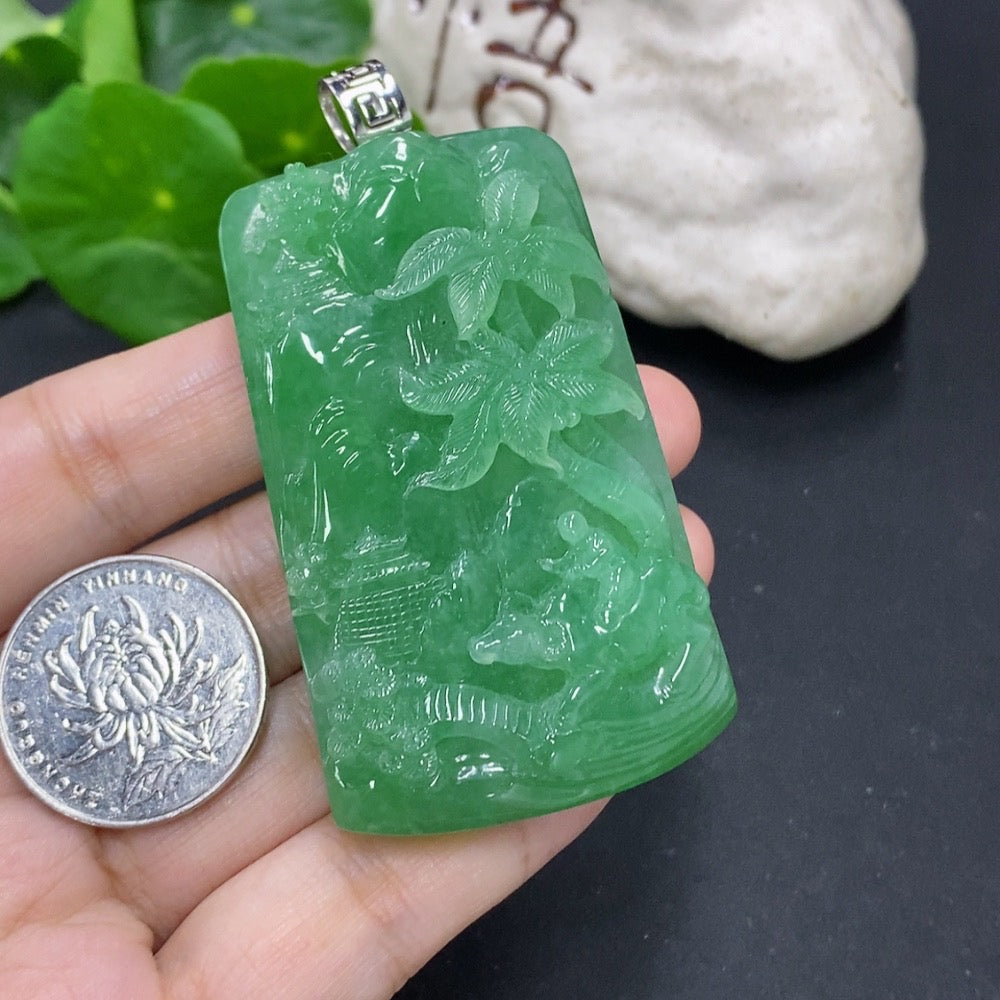 Jadeite landscape pendant with unmarked 18k gold clasp, featuring detailed jade carving and a gold clasp, weighing approximately 75.5g