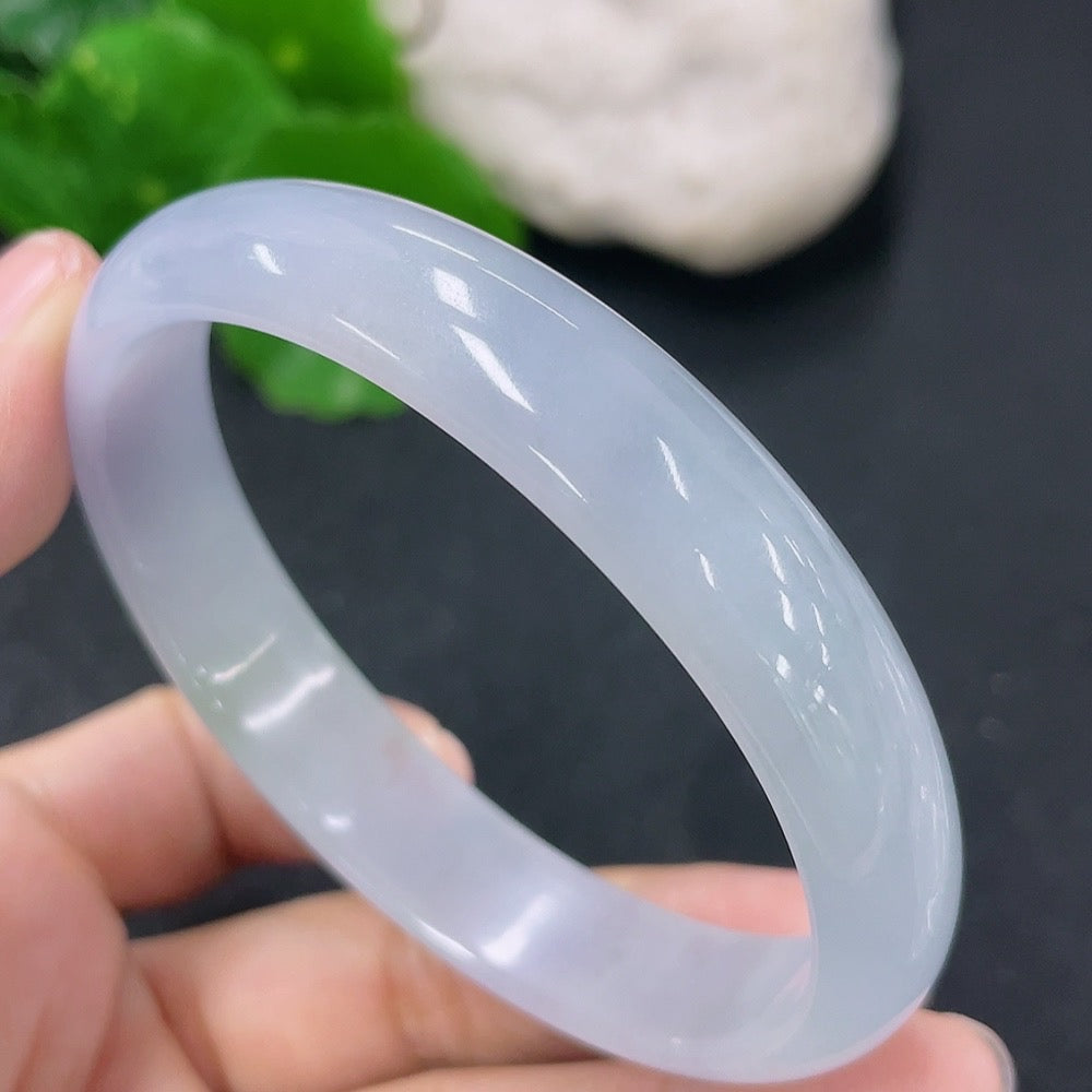 Jadeite Concubine bracelet by HKHQ featuring green jadeite beads, size 57.4/48mm, weighing approximately 34.12g.