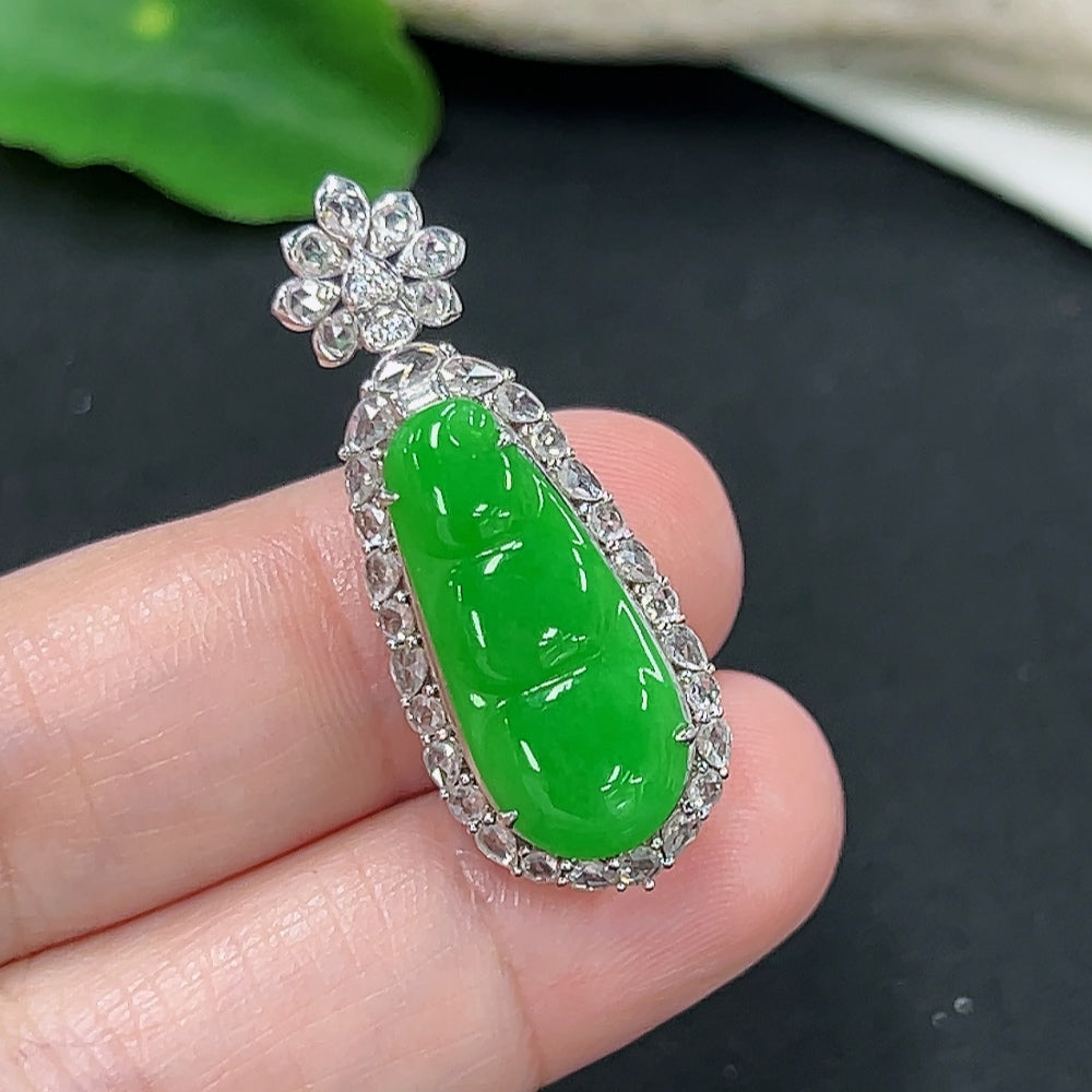Jadeite auspicious bean pendant in 18K gold with diamond accents, showcasing a smooth green jade gemstone and intricate gold setting.