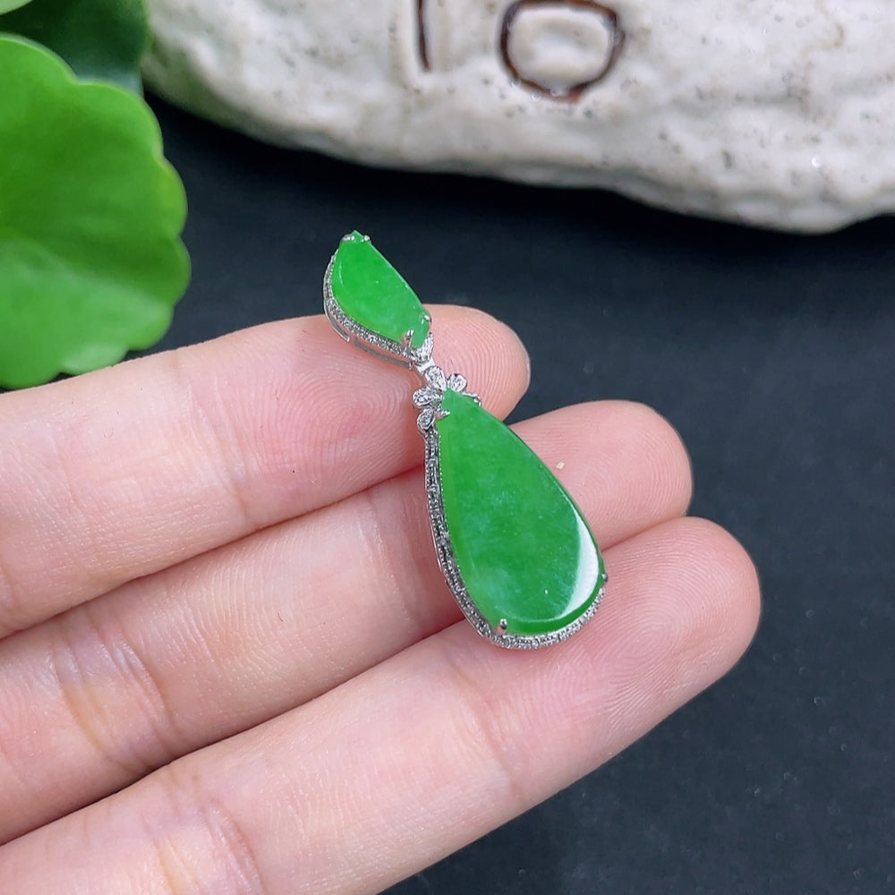 Jadeite water drop pendant with 18K gold and diamond accents, crafted by HKHQ, showing the elegant jewelry design.