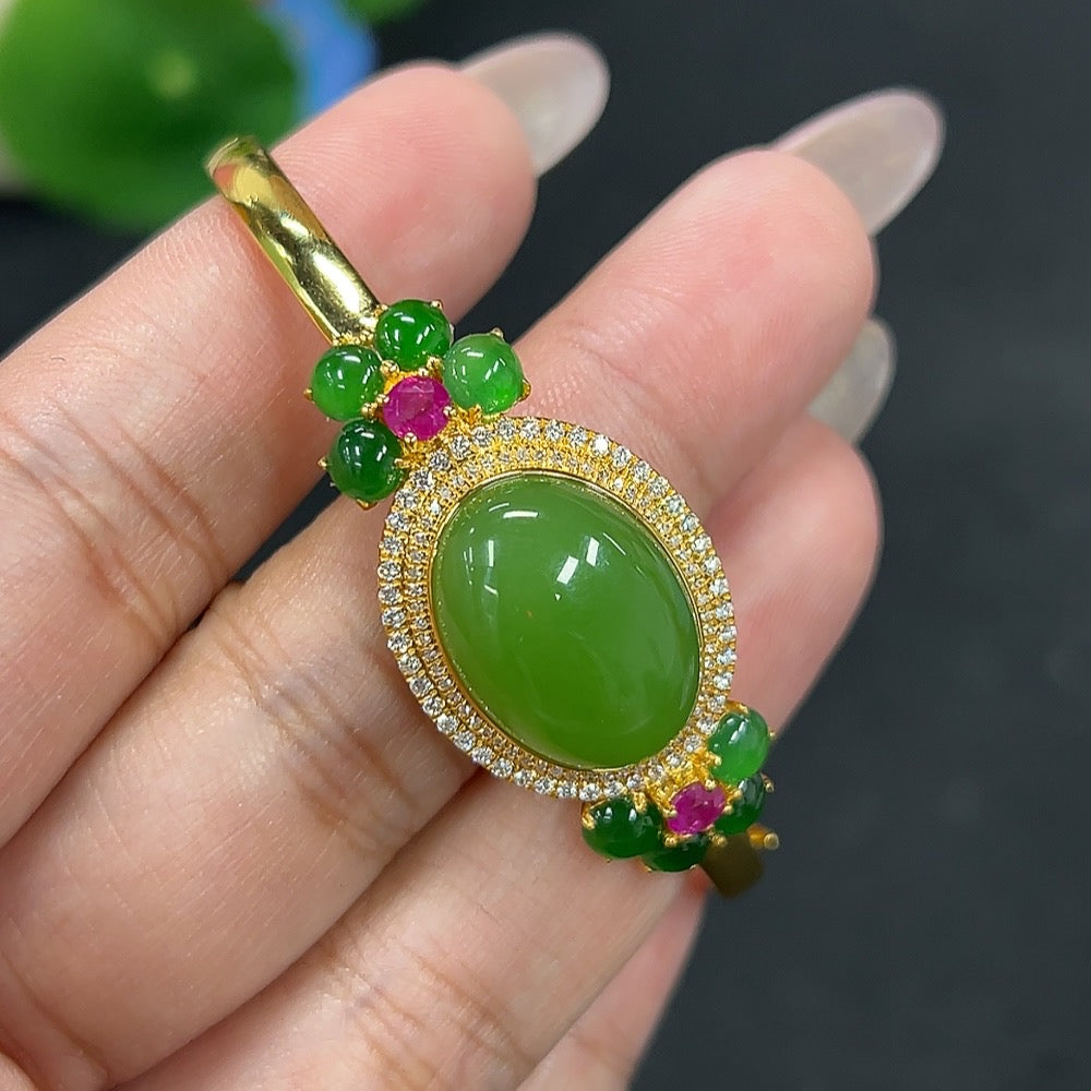 HKHQ Hetian jade inlaid bracelet with small jadeite cabochon, 18K gold, and diamond accents, showcasing elegant craftsmanship.