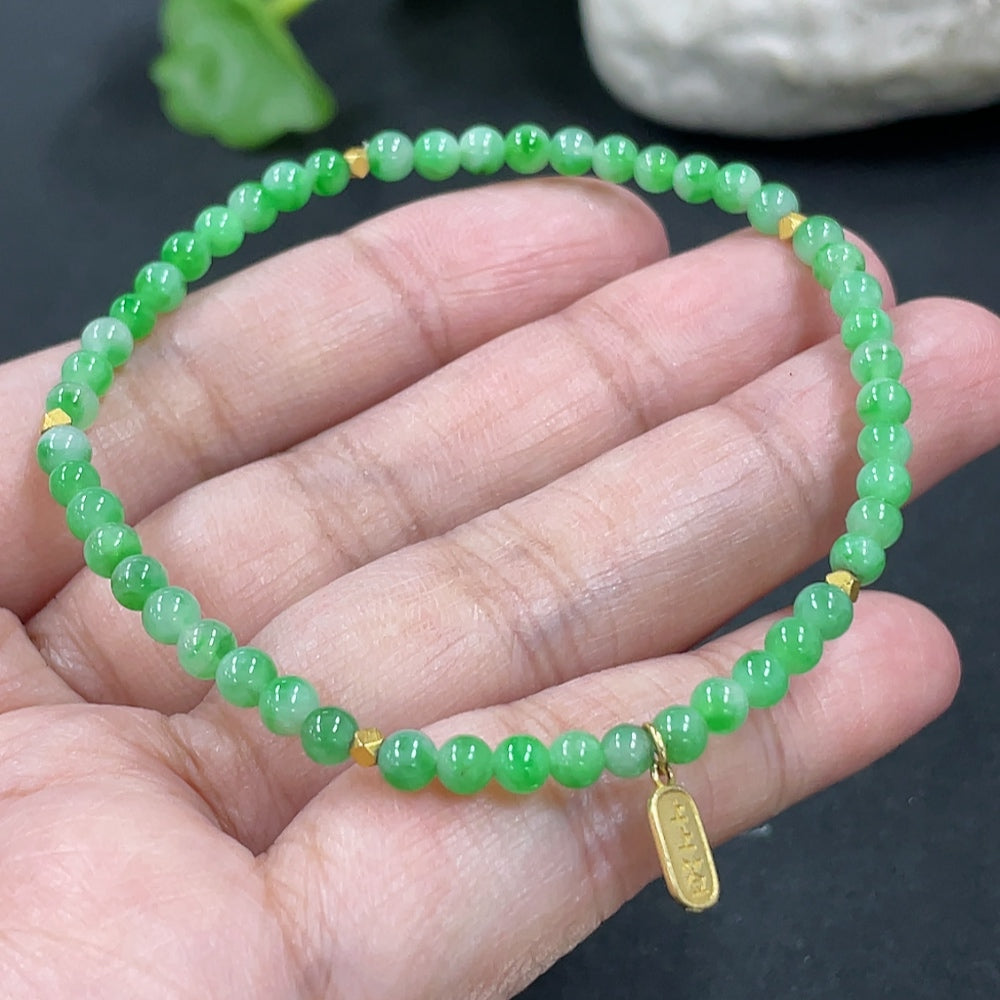 Jadeite bracelet with 3.7mm jade beads, 18k gold accents, weighing approximately 4.6g, designed by HKHQ.