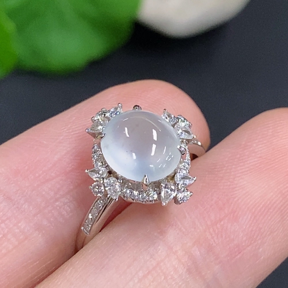 Jadeite cabochon ring with 18k gold band, accented with diamonds, size 10, from HKHQ.