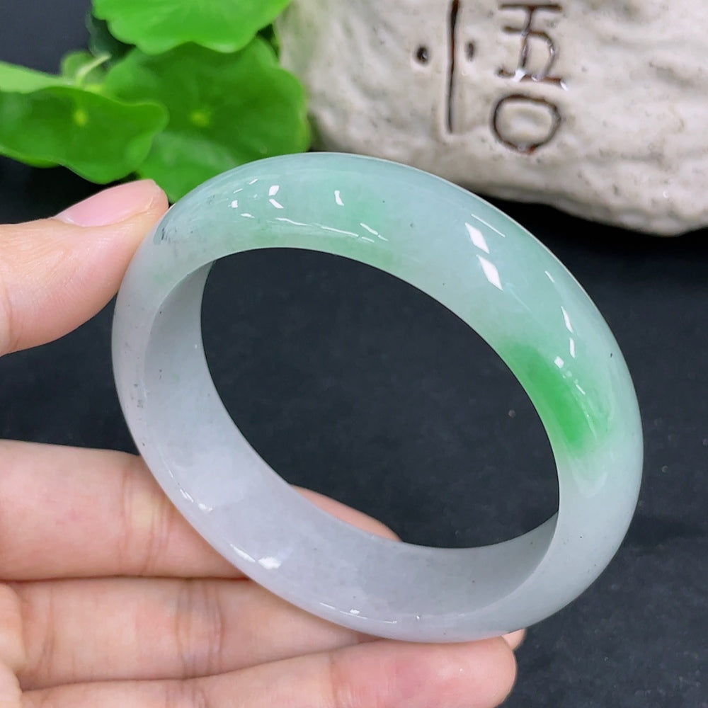 Jadeite round bangle with a total weight of 66.8g, size 55.7, featuring smooth, polished jadeite material from HKHQ.