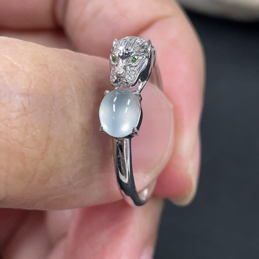 Jadeite cabochon ring with 18K gold and diamond accents, size 14, featuring a polished green jade stone and intricate metalwork.