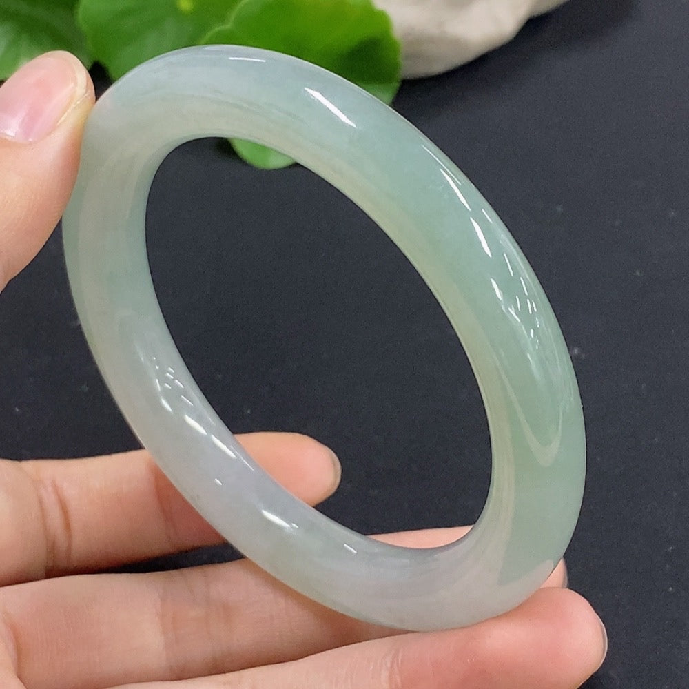 HKHQ jadeite round bangle size 56 with natural jade finish, weighs approximately 54.11g, showcasing smooth, polished craftsmanship.