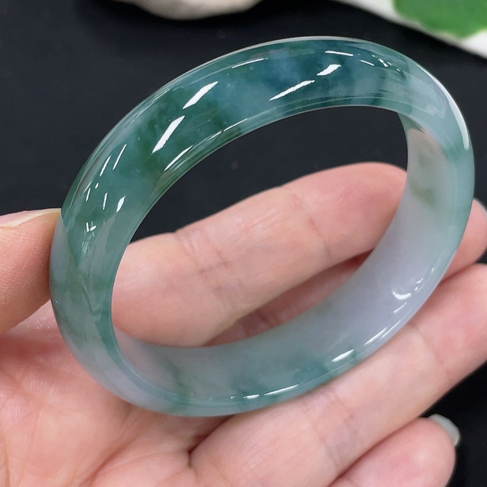 Jadeite Concubine Bracelet by HKHQ featuring green jade stones, 52/46.8 size, total weight approximately 37.6g.