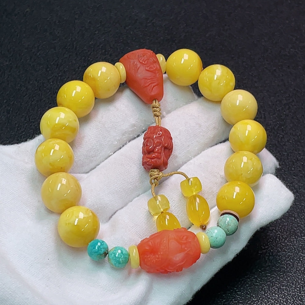 Amber and beeswax bracelet with Southern Red Agate bead, about 13mm, crafted by HUILIU HQ, featuring natural stone elements.