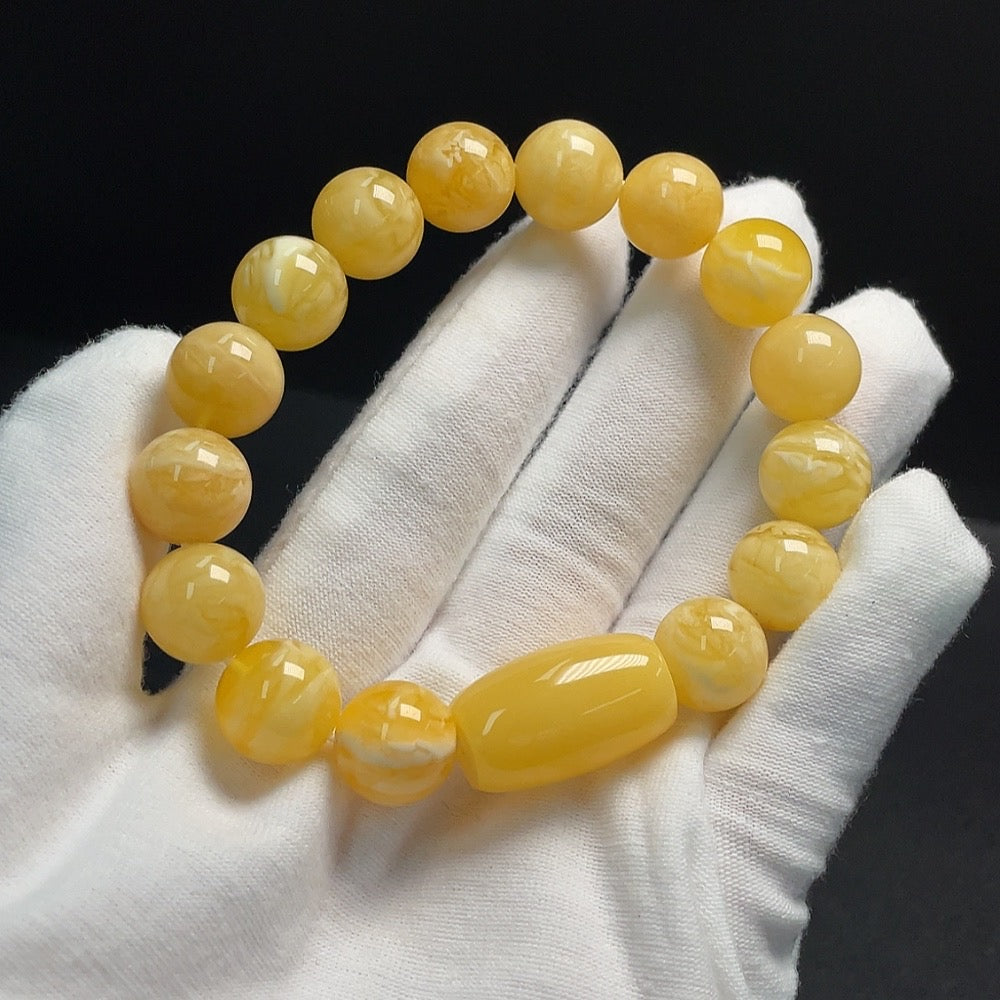 Huiliu Certified Amber beeswax bracelet with 12.1mm beads, natural amber jewelry designed for stylish wear