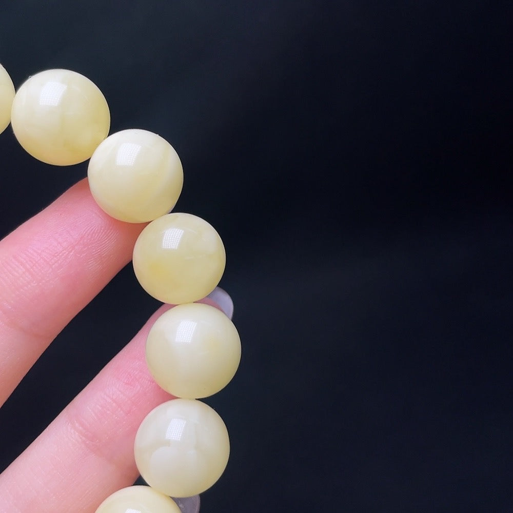 Huiliu Amber Beeswax Bracelet with non-natural stones, 12.3mm size, featuring amber beads and decorative non-accents.