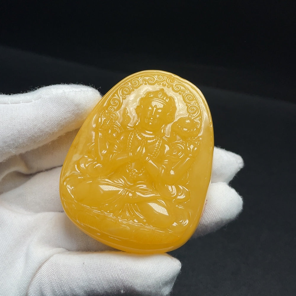 Amber beeswax pendant by HUILIU HQ with visible partial repairs, showcasing natural amber and craftsmanship.