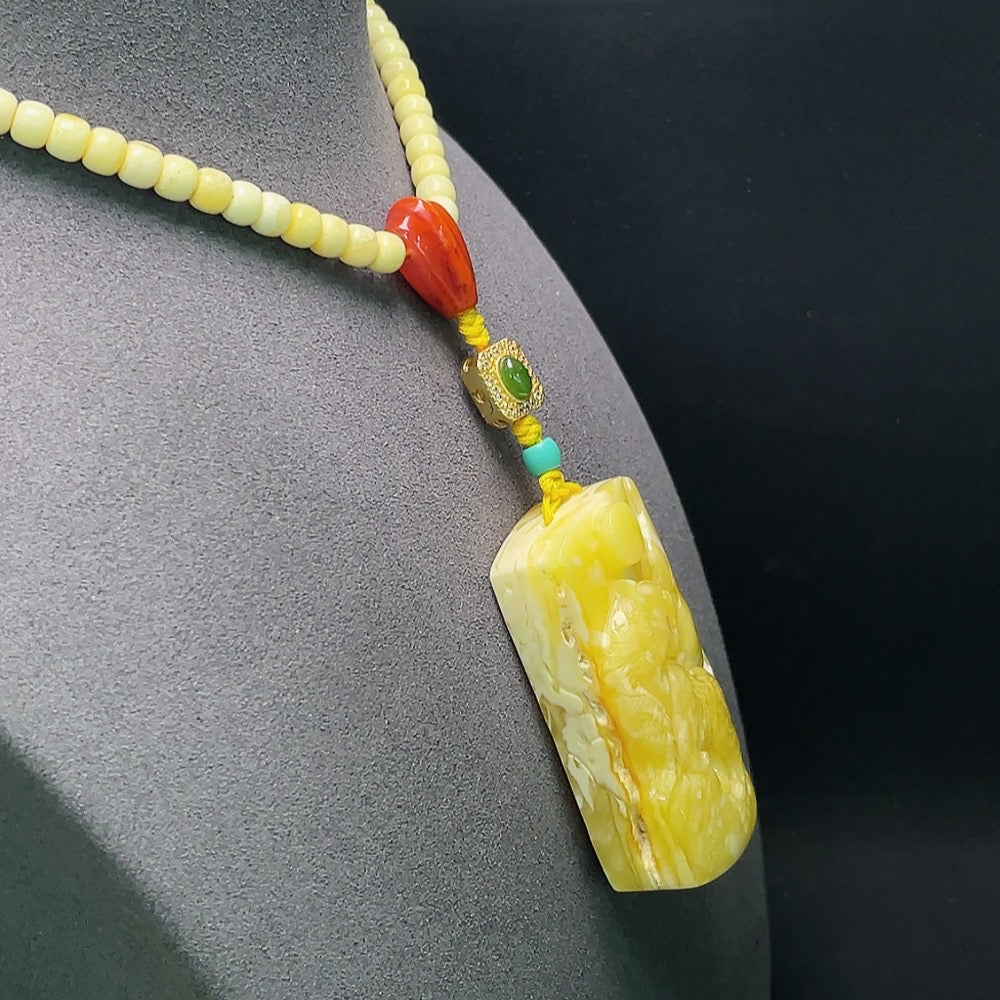 Huiliu Amber Beeswax Pendant with non-natural accent stones, included chain, showcasing warm amber hues and handcrafted design.